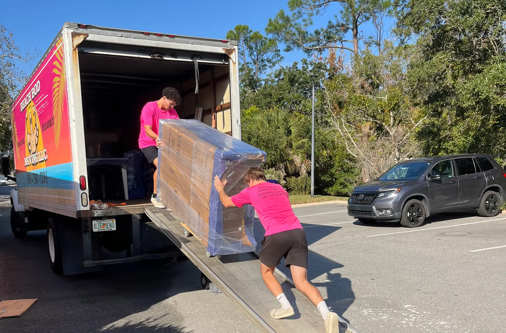 Beach Bod Moving team loading a truck